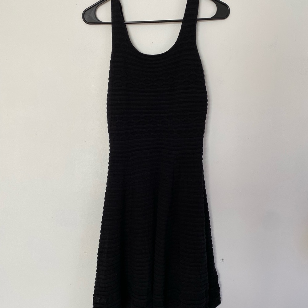 Black patterned dress.